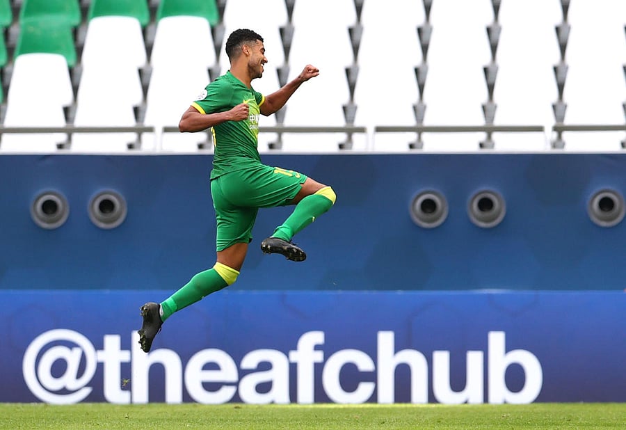 Beijing Guoan's Alan Carvalho celebrates scoring their second goal. Credit: REUTERS