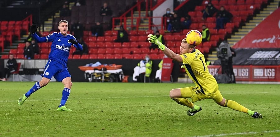 Leicester City's English striker Jamie Vardy (L) scores his team's second goal during the English Premier League football match between Sheffield United and Leicester City. Credit: AFP photo.