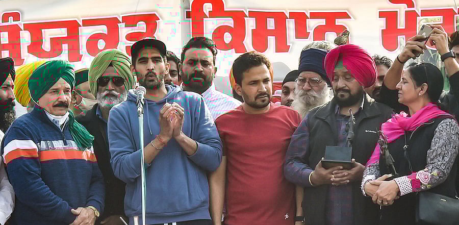 Boxer Vijender Singh joins the farmers with Arjuna and Dronacharya awardees during their 'Delhi Chalo' protest march against the new farm laws. Credit: PTI