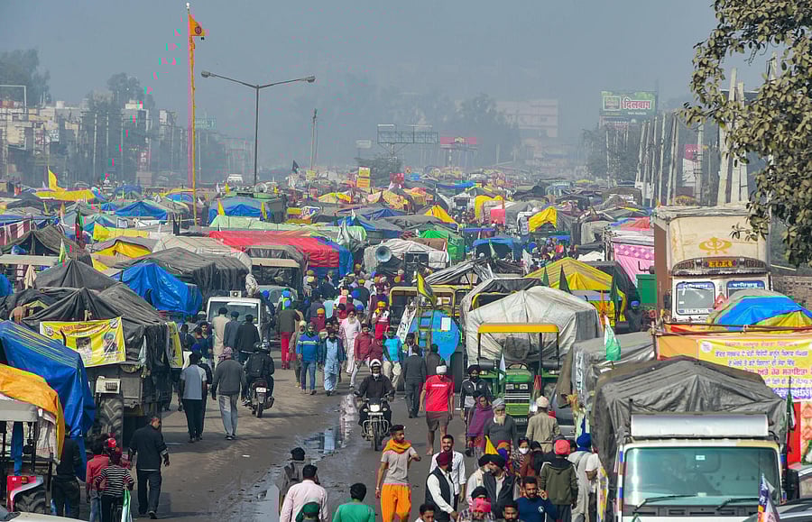 Farmers at Singhu border during their agitation against the Center's new farm laws, in New Delhi. Credit: PTI Photo.