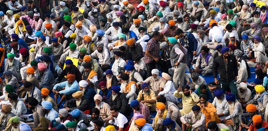 Farmers take part in a demonstration to protest against the central government’s recent agriculture reforms at the Delhi-Haryana state border in Singhu on December 4, 2020. Credit: AFP Photo