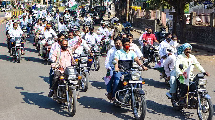 Baliraja Shetkari Sanghatana members participate in a bike rally in support of the nationwide strike. Credit: PTI Photo