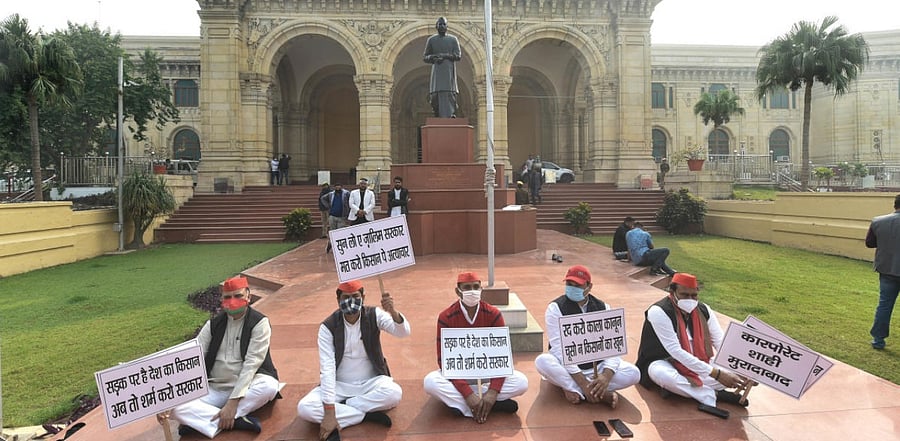 Samajwadi Party (SP) leaders participate in a protest in support of the nationwide strike, called by farmers. Credit: PTI Photo