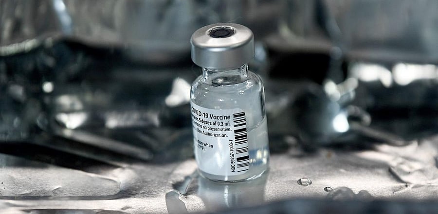 A phial of Pfizer-BioNTech Covid-19 vaccine is seen on a tray at the Louisa Jordan Hospital in Glasgow. Credit: AFP photo.
