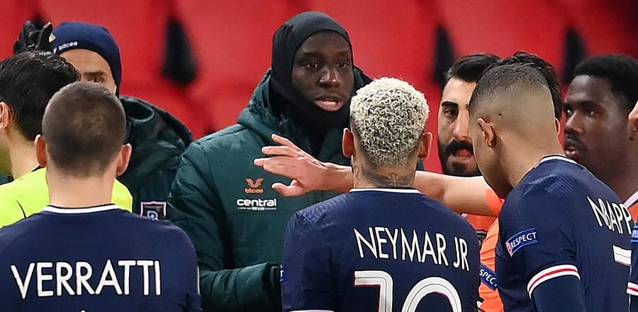 Istanbul Basaksehir's French forward Demba Ba (R) speaks with Paris Saint-Germain's Italian midfielder Marco Verratti, Paris Saint-Germain's Brazilian forward Neymar and Paris Saint-Germain's French forward Kylian Mbappe. Credit: AFP Photo