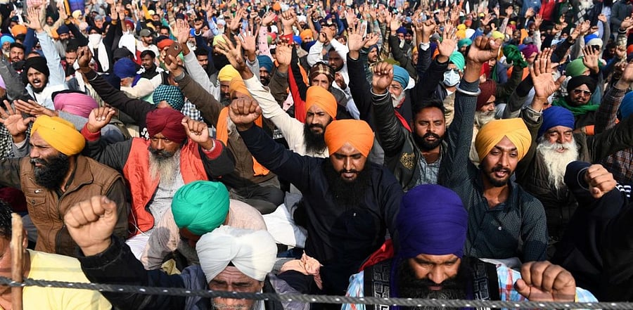 Thousands of farmers have been protesting at various border points for almost two weeks seeking a repeal of the new laws. Credit: AFP Photo