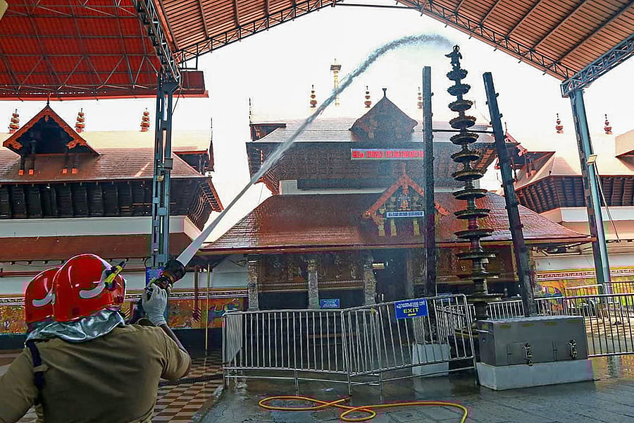 Guruvayur Sri Krishna temple being cleaned ahead of its reopening tomororow, during the ongoing COVID-19 lockdown, in Kochi, Monday, June 8, 2020. Credit: PTI Photo