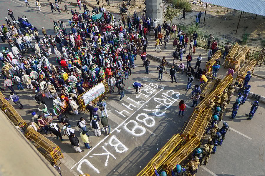 Bharatiya Kisan Union (BKU) members protest after police imposed section 144 at Ghazipur border, during their 'Delhi Chalo' march against the new farm laws, in New Delhi, Monday, Nov. 30, 2020. Credit: PTI Photo