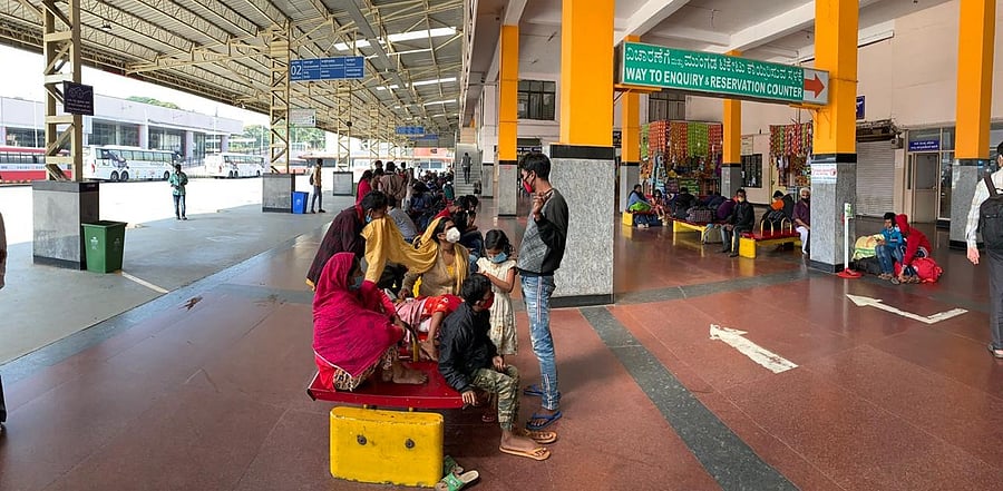 People wait for buses at KSRTC bus stand in majestic. Credit: DH Photo/Pushkar V