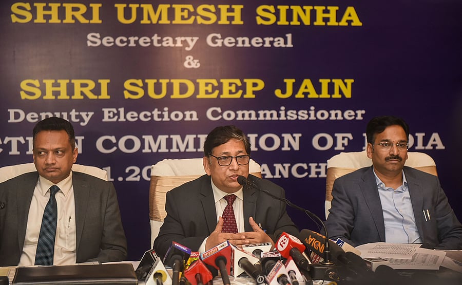 Election Commission of India (ECI) Secretary General Umesh Sinha (C) flanked by Dy Election Commissioner Sudeep Jain (L) and Jharkhand Chief Electrol Officer Vinay Kumar Choubey. Credit: PTI Photo