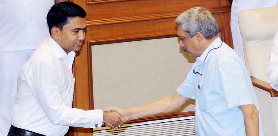 CM Pramod Sawant and former Chief Minister Manohar Parikar. Credit: PTI Photo  