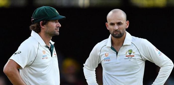 Australia's Joe Burns and Nathon Lyon. Credit: AFP Photo