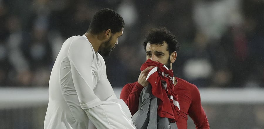 Fulham's Ruben Loftus-Cheek and Liverpool's Mohamed Salah swap shirts after their 1-1 draw at the Craven Cottage in London. Credit: Reuters