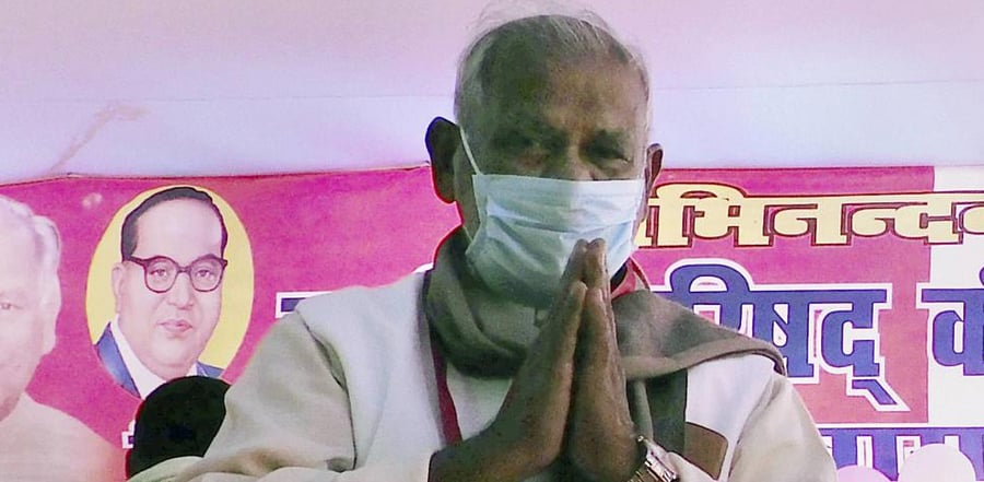 HAM(S) Chief Jitan Ram Manjhi greets during the party's council meeting, in Patna, Sunday, Dec. 13, 2020. Credit: PTI Photo