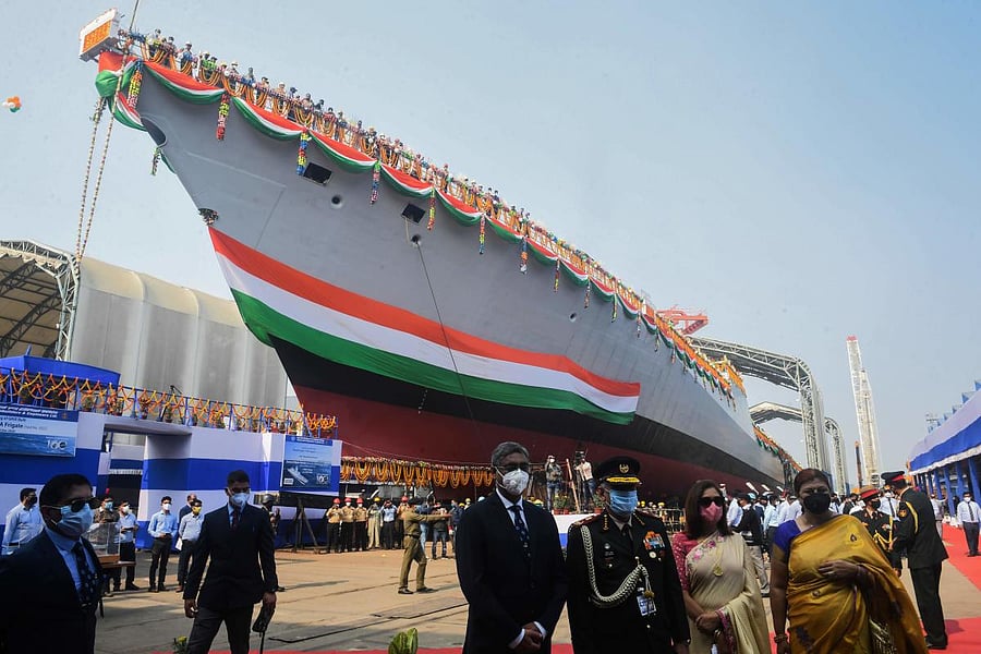 Chief of Defence Staff Bipin Rawat (3L) poses for a picture with other officials before the launch ceremony for the stealth frigate Himgiri into the Hooghly River in Kolkata. Credit: AFP photo.