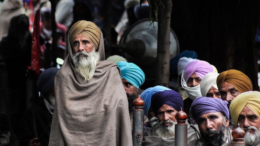 Members of various farmer unions participate in a protest against the Centre's farm reform laws, outside the Deputy Commissioner (DC) office in Amritsar. Credit: PTI Photo
