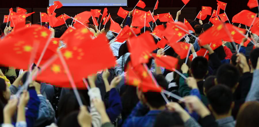 Flags with the logo of the Communist Party of China. Representative image/Credit: AFP Photo