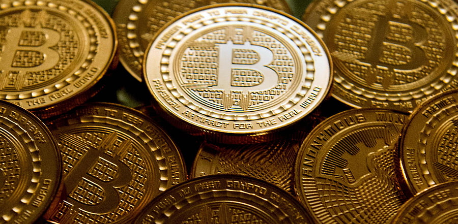 Proponents argue the cryptocurrency is muscling in on gold as a portfolio diversifier amid dollar weakness and potential inflationary pressure. Credit: AFP