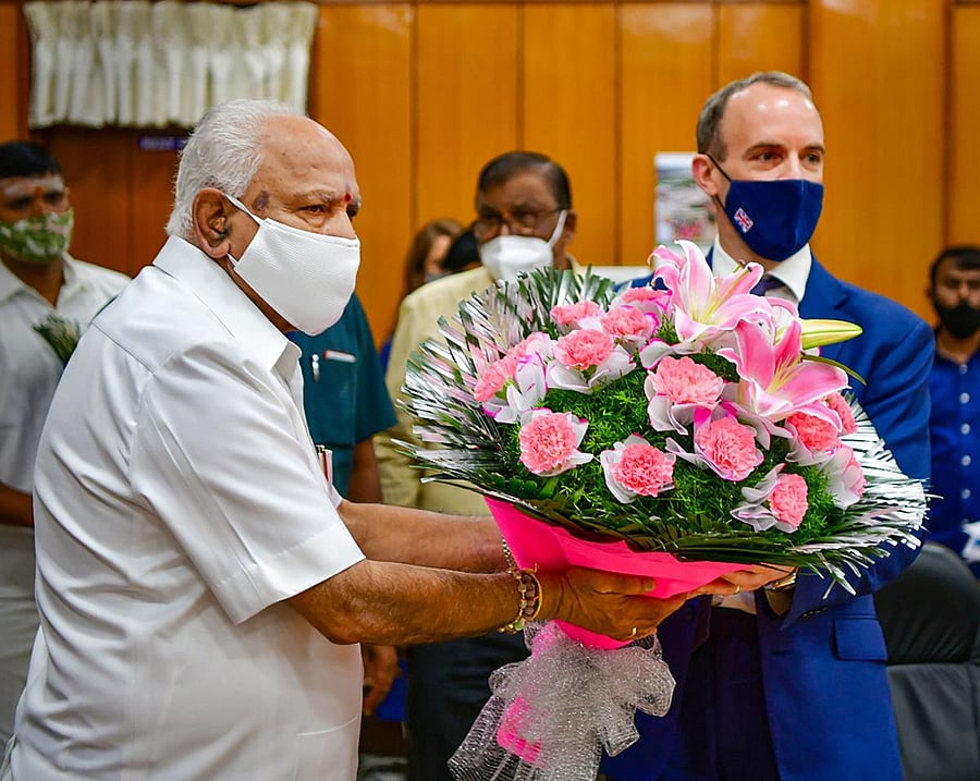 Karnataka CM BS Yediyurappa greets British Foreign Secretary Dominic Raab during a meeting in Bengaluru. Credit: PTI