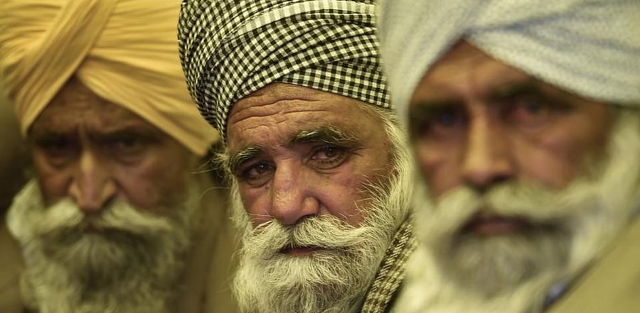 Farmers during their protest against the new farm laws, at Singhu Border in New Delhi, Wednesday, Dec. 16, 2020. Credit: PTI Photo