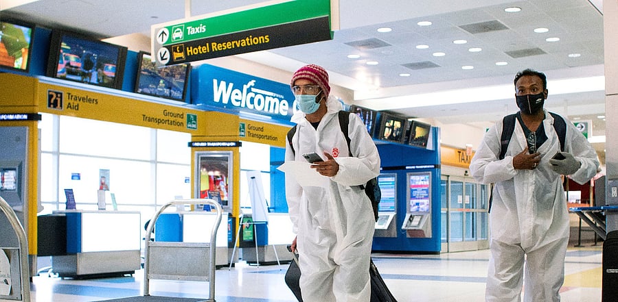 Passengers arrive on a flight from London amid new restrictions to prevent the spread of coronavirus disease (COVID-19) at JFK International Airport. Credit: Reuters Photo