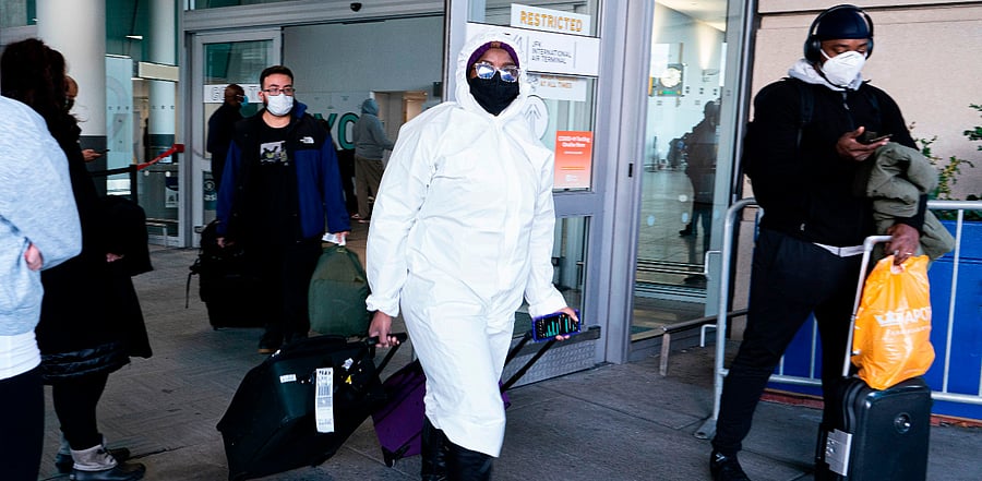Travellers Arrive at terminal 4 at JFK International airport in New York. Credit: AFP Photo