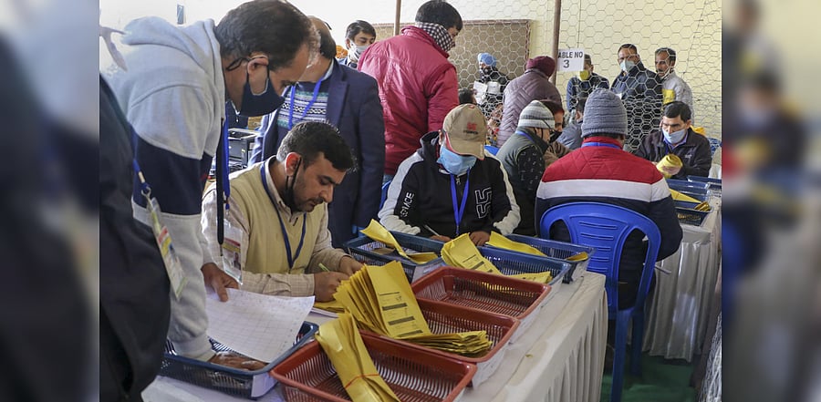 Counting of votes for the recently concluded District Development Council elections in progress at a centre, in Jammu, Tuesday, Dec. 22, 2020. Credit: PTI Photo