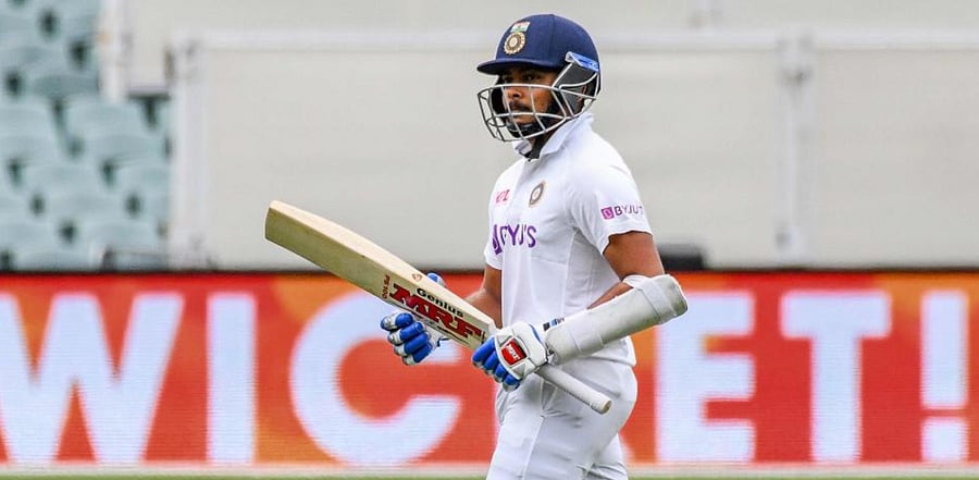 Indian batsman Prithvi Shaw walks back to the pavilion after his dismissal on day one of the first cricket Test match between Australia and India in Adelaide on December 17, 2020. Credit: AFP Photo