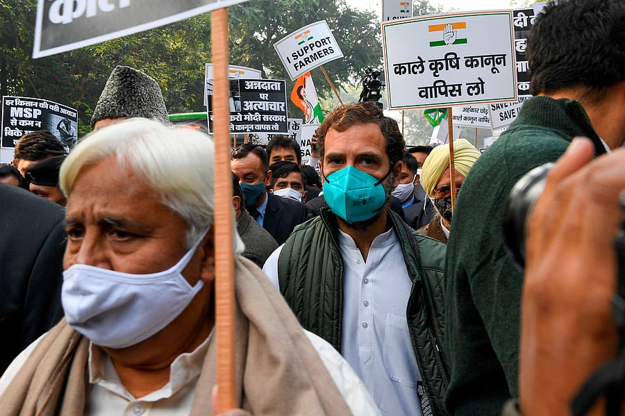Congress party leader Rahul Gandhi along with party workers and members of Parliament take part in a march towards presidential palace 'Rashtrapati Bhavan' to request Indian President Ram Nath Kovind to repeal the Centre's recent agricultural reforms in New Delhi on December 24, 2020. Credit: AFP Photo