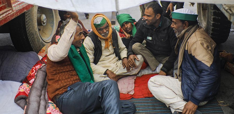 Farmers during a protest against the new farm laws, at Ghazipur in New Delhi. Credit: PTI
