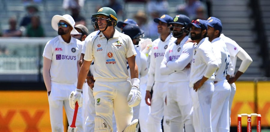Australia's Marnus Labuschagne watches the screen as he awaits a decision on the first day of the second cricket Test match between Australia and India played at the MCG in Melbourne. Credit: AFP