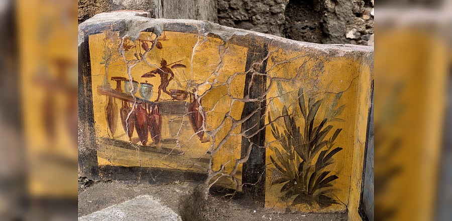 A fresco on an ancient counter uncovered during excavations in Pompeii, Italy, is seen in this handout picture released December 26, 2020.  Credit: AFP Photo