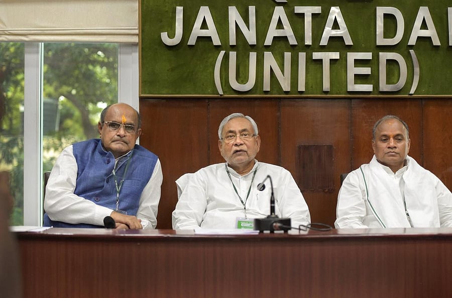 Bihar Chief Minister and JDU Chief Nitish Kumar, General Secretary K C Tyagi (L) and General Secretary (Organisation), RCP Singh. Credit: PTI Photo