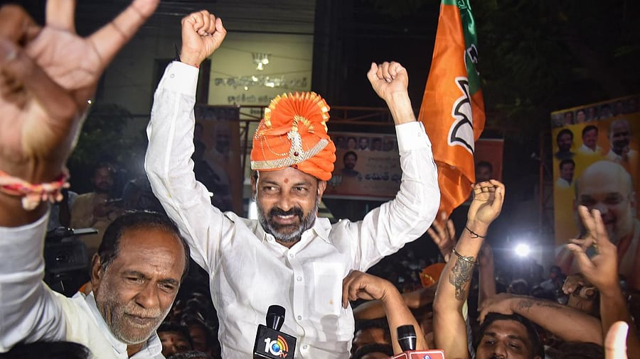 BJP State President Bandi Sanjay celebrates during the counting day of Greater Hyderabad Municipal Corporation (GHMC) elections, in Hyderabad. Credit: PTI File Photo
