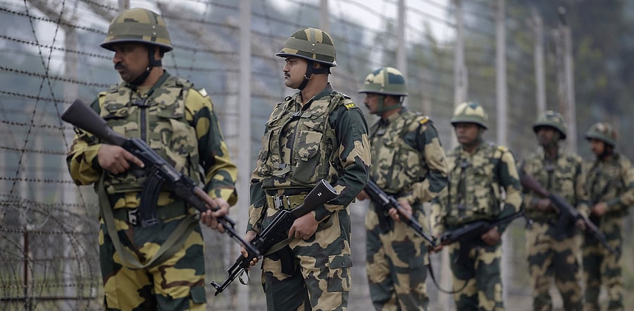 Border Security Force (BSF) patrol near the international border at Hiranagar sector in Jammu. Credit: PTI