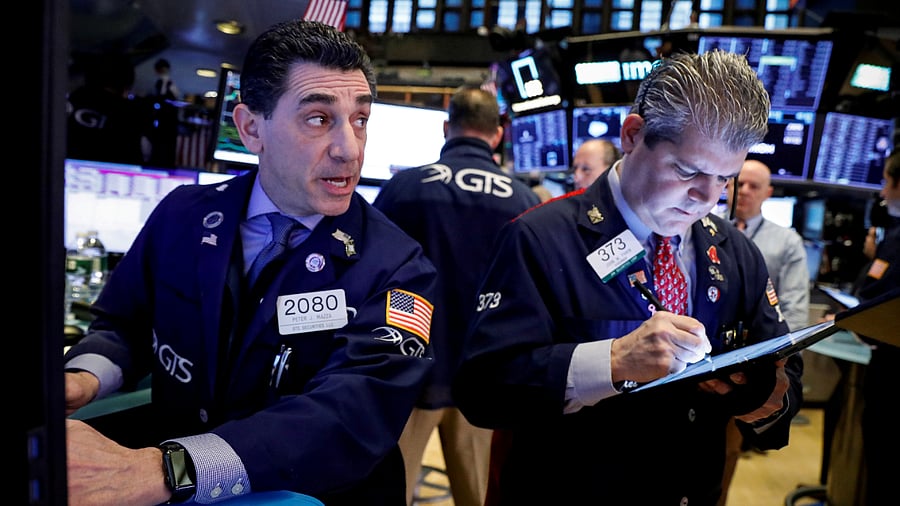 Traders work on the floor at the New York Stock Exchange (NYSE). Credit: Reuters Photo