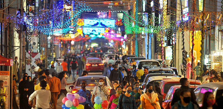 Commercial Street is lit up with colourful lights for New Year celebrations in Bengaluru on Wednesday. Credit: DH File Photo/Pushkar V