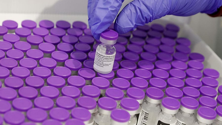 A healthcare worker prepares a dose of the Pfizer-BioNtech Covid-19 vaccine. Credit: AFP