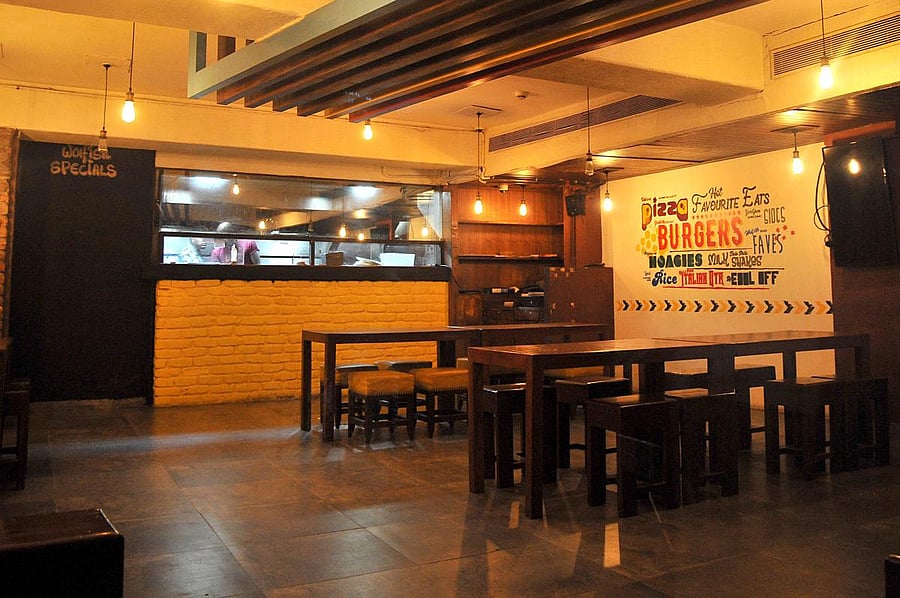 Cafes, restaurants and pubs on Church Street had few customers on New Year's Eve due to restrictions on public revelry. Credit: DH Photo