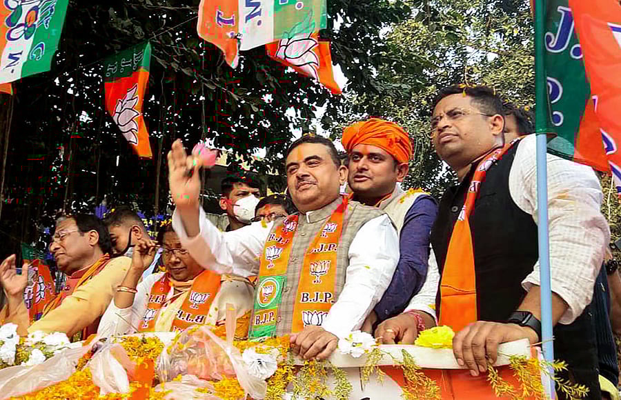 BJP leader Suvendu Adhikari during a roadshow from Mecheda Bypass to Central Bus Stand in Kanthi, East Midnapore district, Thursday, Dec. 24, 2020. Credit: PTI Photo