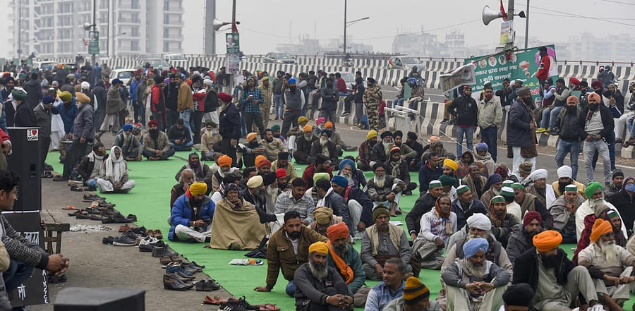 Farmers during their protest against the new farm laws, at Ghazipur border in New Delhi. Credit: PTI Photo