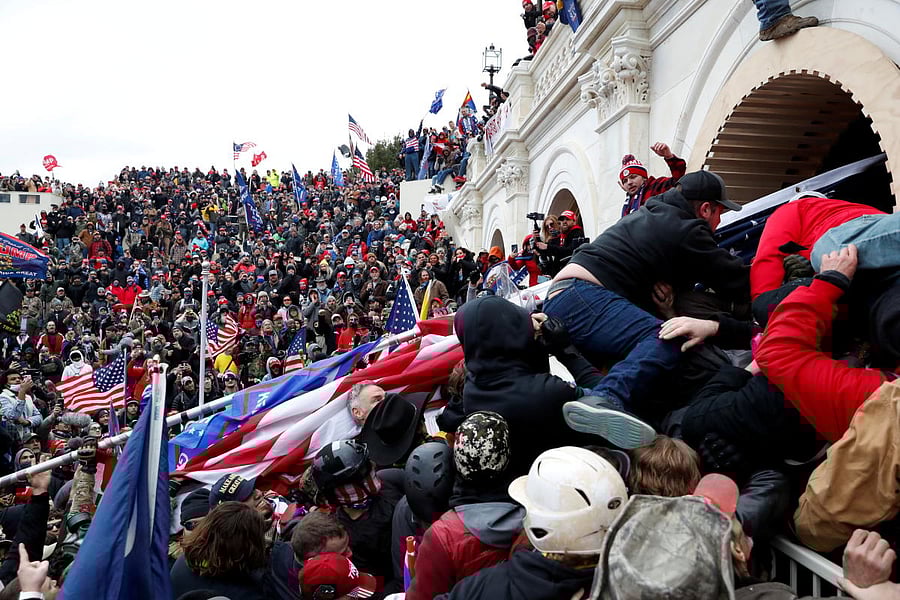 Pro-Trump protesters storm into the U.S. Capitol during clashes with police, during a rally to contest the certification of the 2020 U.S. presidential election results by the U.S. Congress, in Washington, U.S, January 6, 2021. Credit: REUTERS