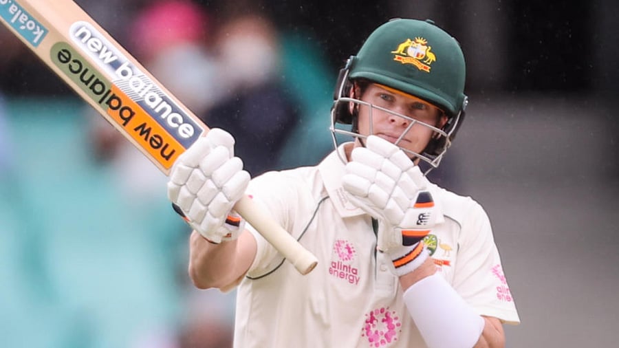 Australia's Steve Smith reacts after reaching fifty runs during day two of the third cricket Test match between Australia and India at the Sydney Cricket Ground (SCG) on January 8, 2021. Credit: AFP Photo