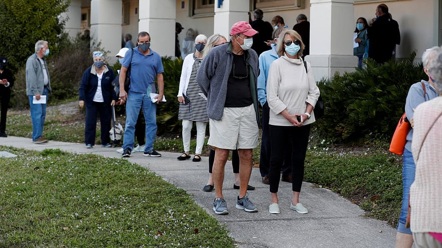Seniors, who are 65 and over, wait in line at the Department of Health Sarasota Covid-19 vaccination clinic in Sarasota, Florida. Credit: Reuters Photo