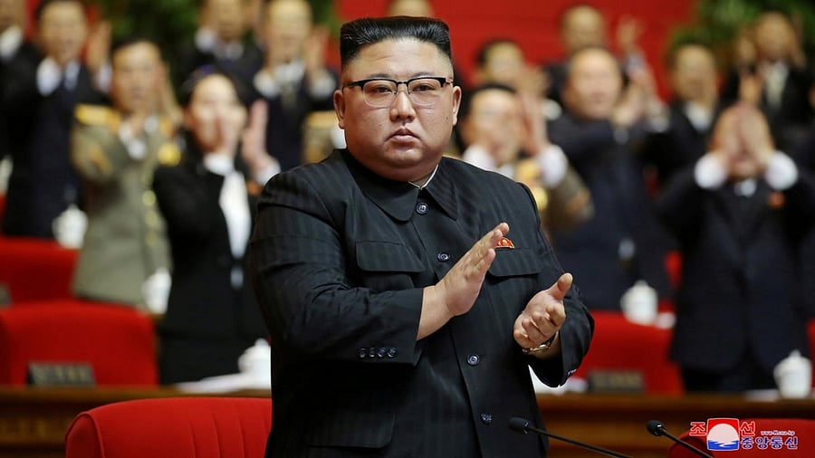 North Korean leader Kim Jong Un applauds at the 8th Congress of the Workers' Party in Pyongyang, North Korea, in this photo supplied by North Korea's Central News Agency (KCNA) on January 11, 2021. Credit: KCNA/via Reuters.