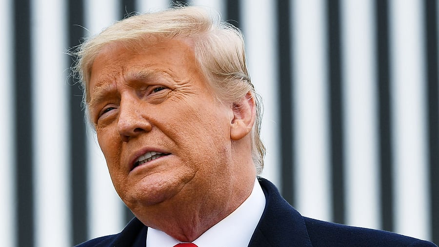 US President Donald Trump speaks following a section of the border wall in Alamo, Texas. Credit: AFP File Photo