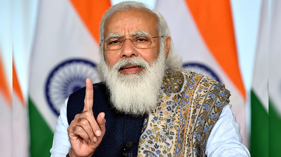 Prime Minister Narendra Modi during the launch of Covid-19 coronavirus vaccination drive via video conferencing in New Delhi. Credit: PIB/AFP