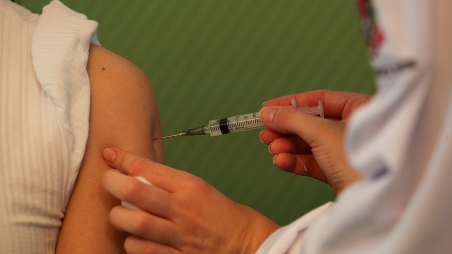 A nurse receives a dose of the Sinovac's Covid-19 vaccine, after Brazil health regulator Anvisa approved its emergency use at Hospital das Clinicas in Sao Paulo, Brazil. Credit: Reuters File Photo