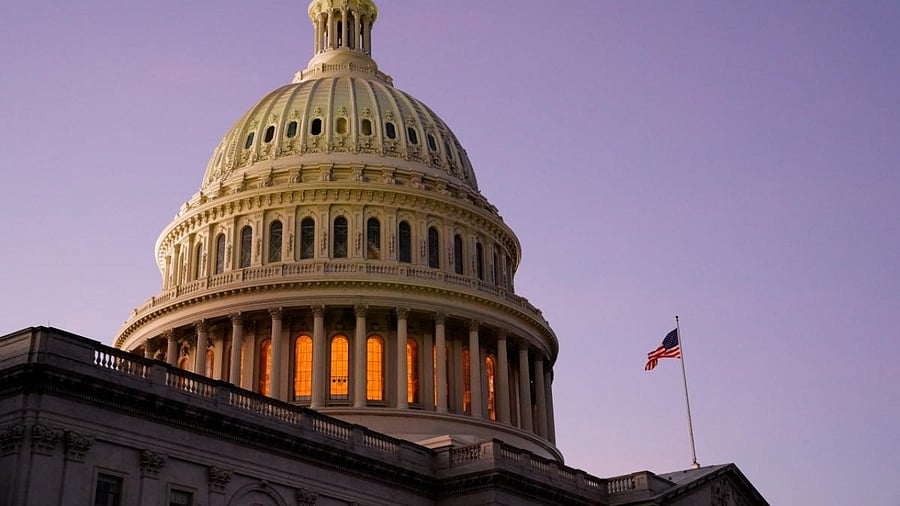 The US Capitol is seen the night before Joe Biden's presidential inauguration in Washington. Credit: Reuters.