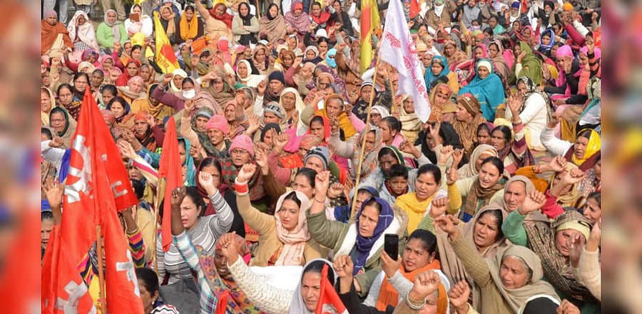 Activists of various organisations take part in a demonstration held in support of farmers who are continuing their protest against the central government's recent agricultural reforms in Amritsar on January 18, 2021. Credit: AFP Photo
